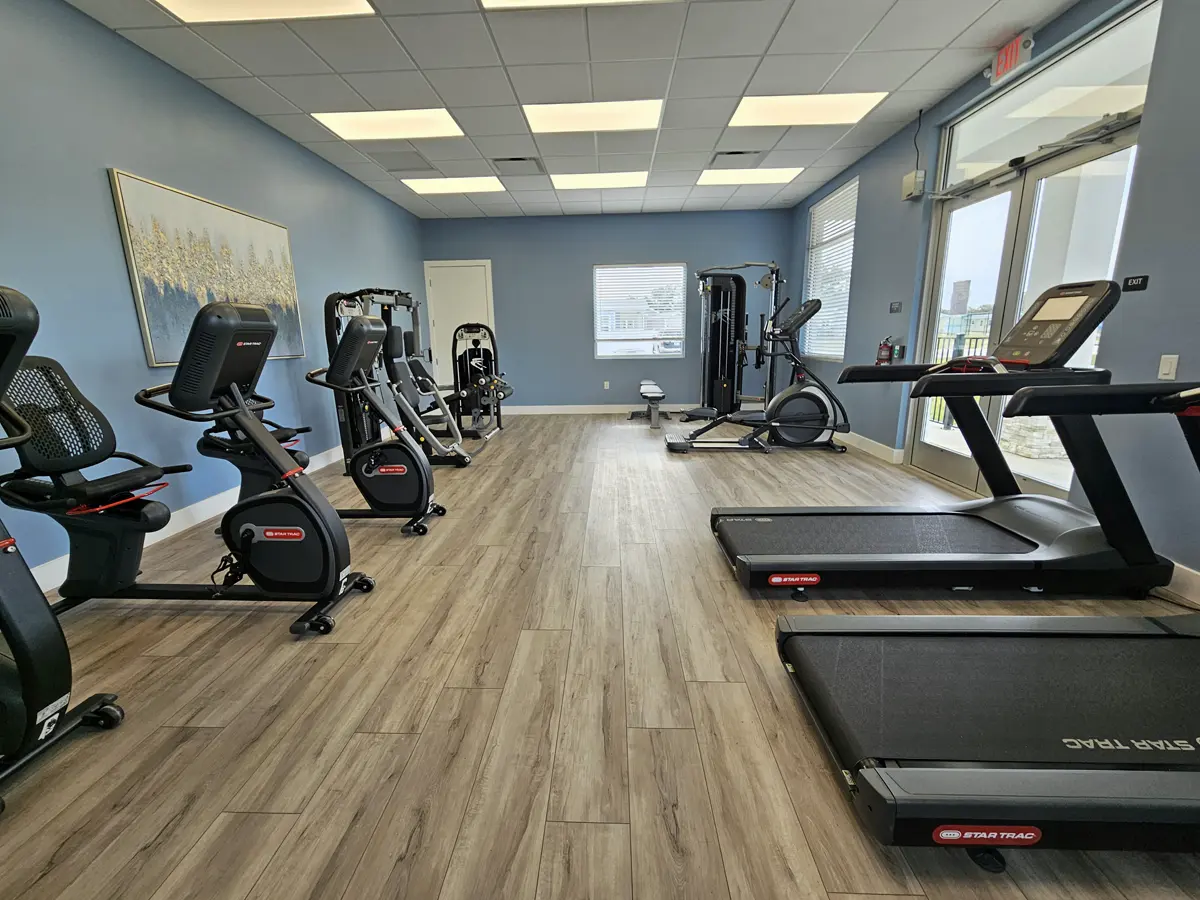 Well-equipped community gym at Forest Lake Estates in Zephyrhills, Florida