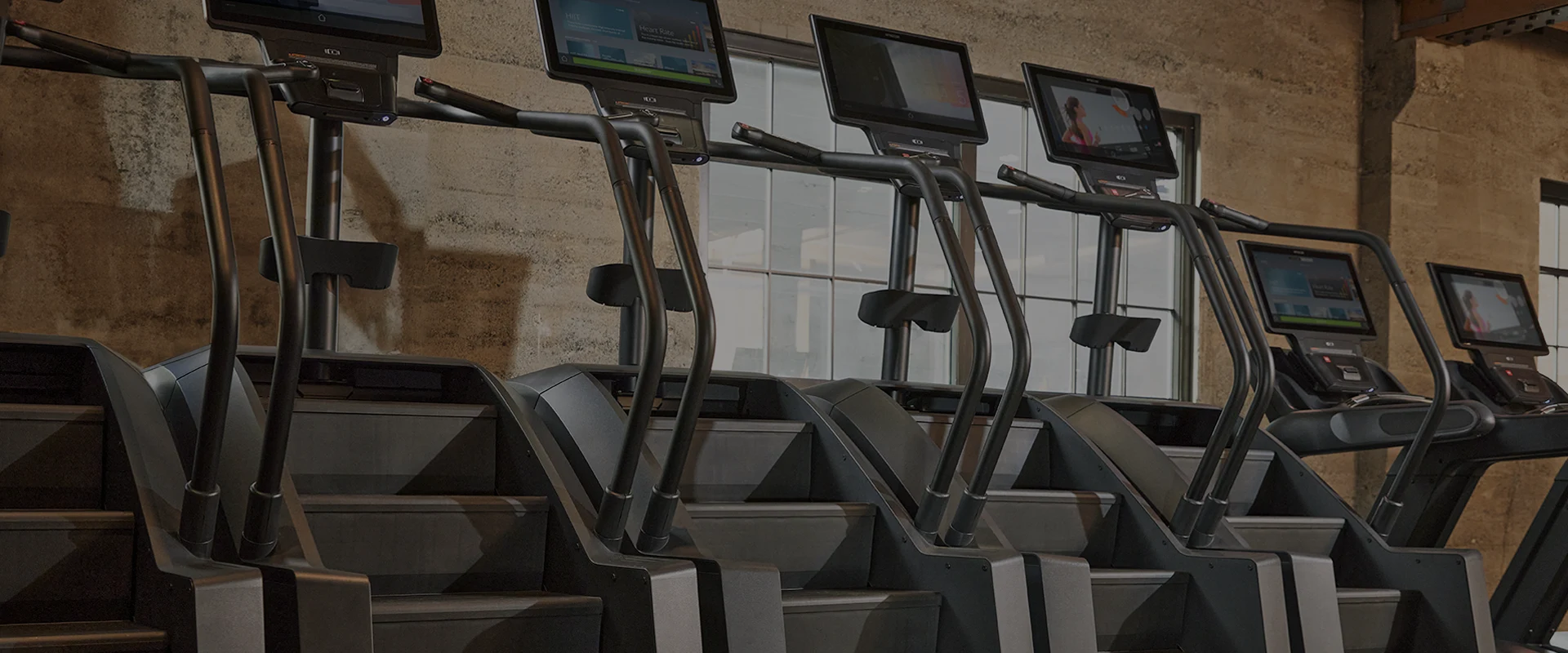 Precor SCL 800 Series stair climbers in a shared fitness space